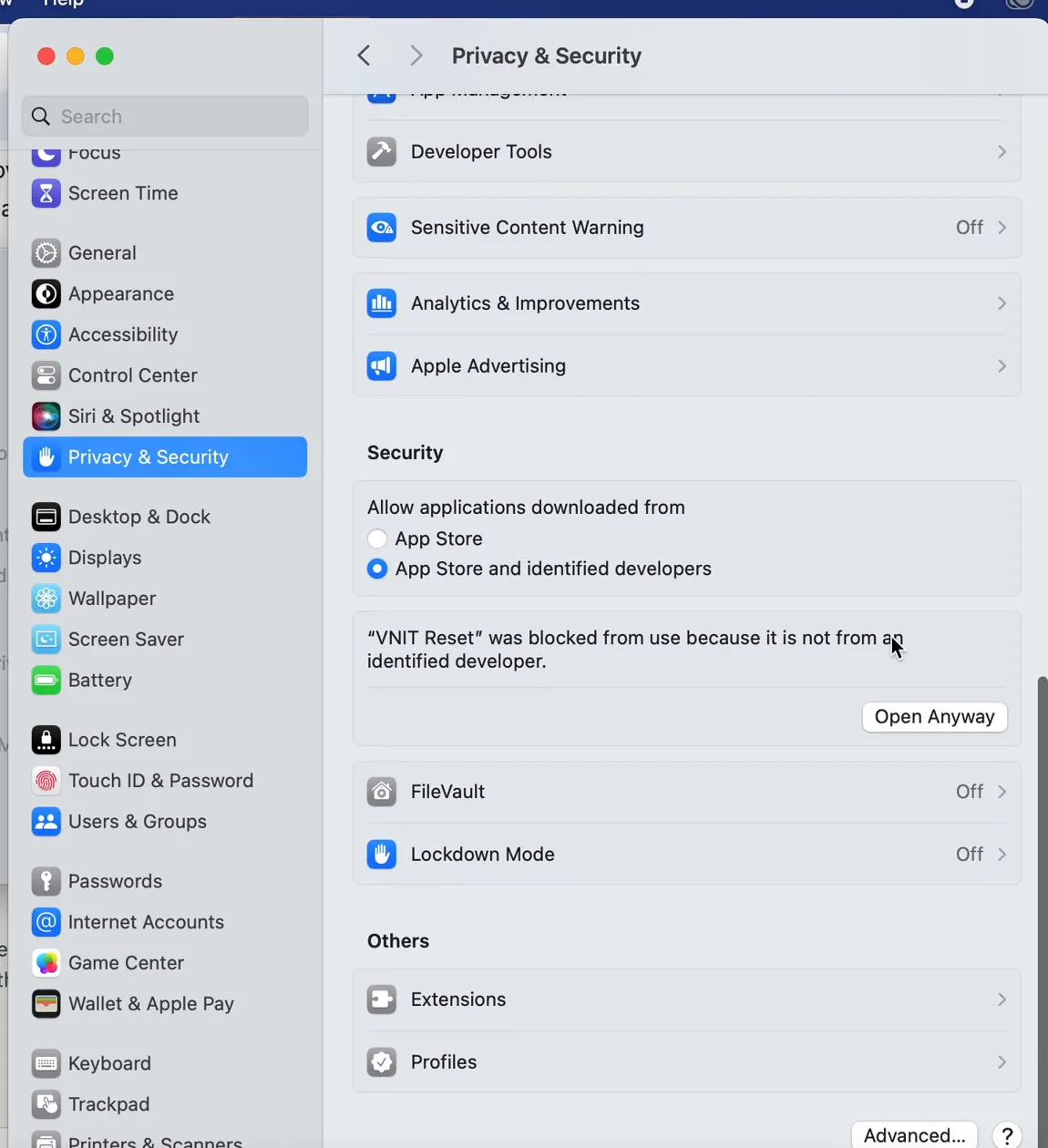 System Settings, Privacy & Security, with the Open Anyway button next to the VNIT Reset message